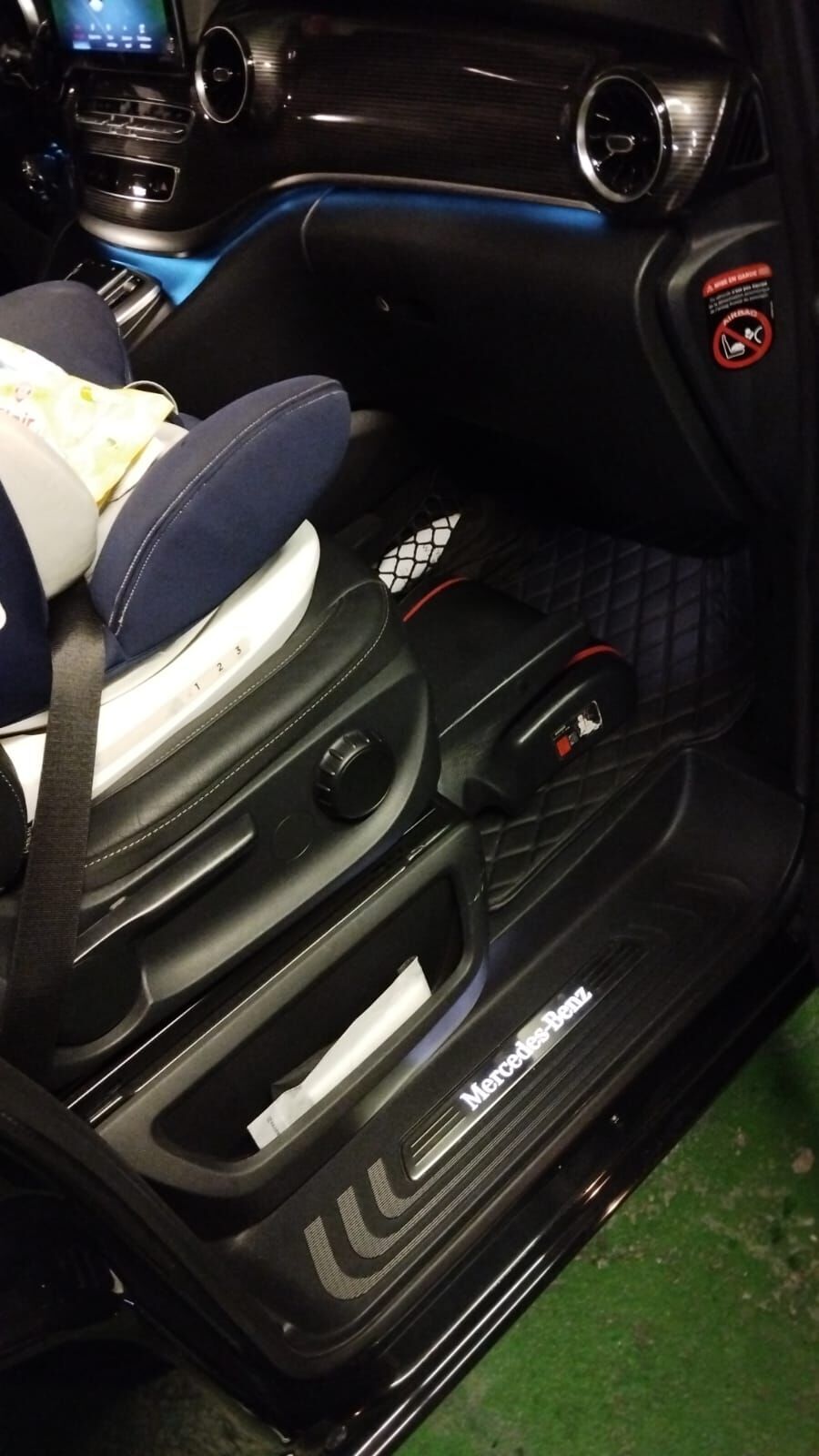 Child car seat installed in our Mercedes V-Class before a family pickup